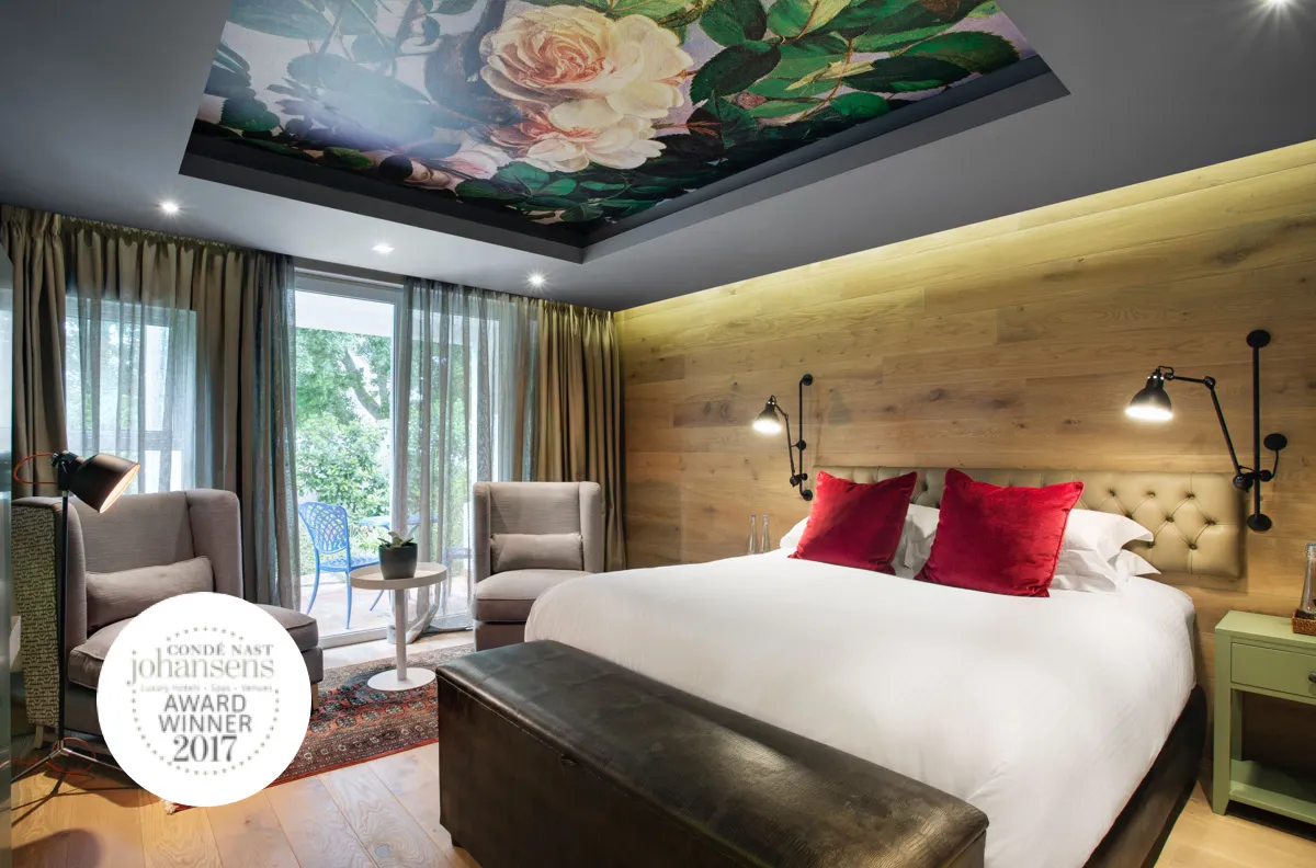 Modern bedroom with floral ceiling wooden wall and large window