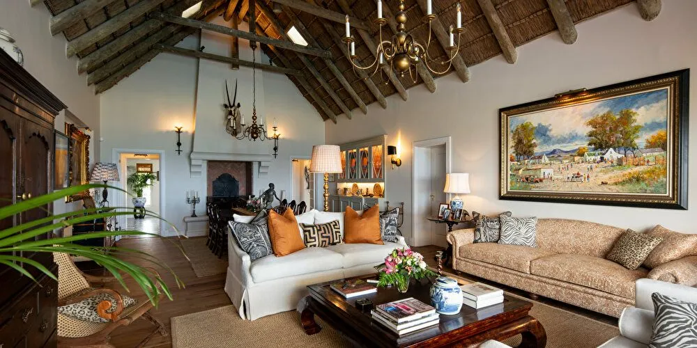 Cozy living room with fireplace paintings and elegant furniture